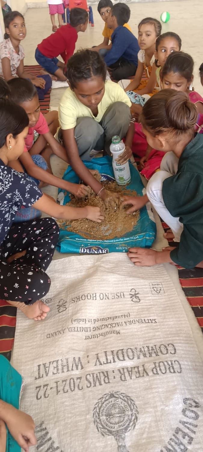Children planting seeds during an Earth Day workshop